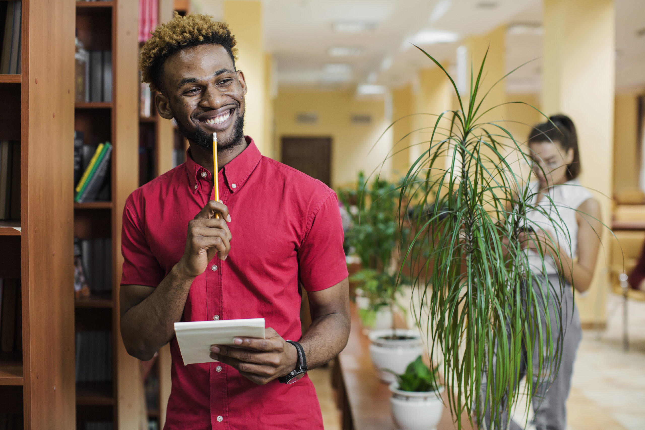 Home cheerful man with notepad